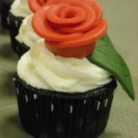 Aopi Cupcakes! Tried the rolled rose method using my circle cutters and I loved it! Great way to make simple roses fast