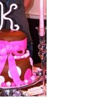 Polka Dot Baby Shower Cake Vanilla cake with chocolate MMF. Hot pink and baby pink polka dots and a hot pink fondant bow