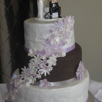First Wedding Cake This is my first wedding cake. 10", 8" and 6" round. The 10" is dark chocolate mudcake, nutella buttercream filling,...