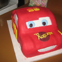 Lightning Mcqueen Birthday Cake My first attempt at carving a cake into a car! Chocolate cake, chocolate ganache and fond.ant
