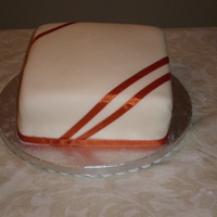 Simple Autumn Cake I have wanted to try the ribbon thing for a while and I found this great fall color! Simple but nice!