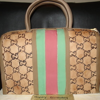 Gucci Bag Cake fondant covered gucci bag cake