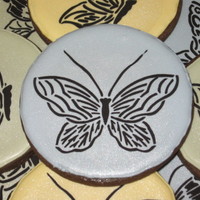 Butterfly Cookies Here's my first stencil project. I love stenciling! The 3 & 5/8" round cookies are Pumpkinwaffles Dark Chocolate Rolled Sugar...