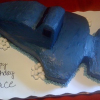 Jace's Fighter Jet First attempt to sculpt a cake...not the best fighter jet, but the kid loved it and that's all that mattered!!! white cake with...