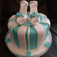Tiffany Shoes Cake Bright blue turquoise cake with white stripes like a Tiffany box! The shoes are made of gumpaste and pearl dusted and then dressed the...
