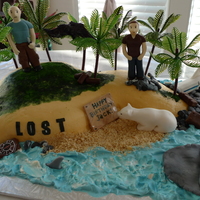 Lost Cake A cake made for true fans of the TV show "LOST". The cake is carved into a shape of the island. The cake is chocolate buttercream...