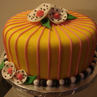 Kaitlin's Birthday Cake Marshmallow fondant with fondant and gumpaste accents. First attempt covering a cake in fondant!