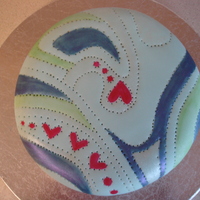 Quilted Valentine's Day Cake 6" cake covered in MMF. Used a toothpick to imprint the quilted pattern on the fondant. Painted with powdered food coloring. Just got...