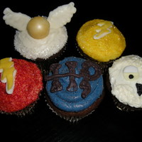 Harry Potter Cupcakes Chocolate cupcakes with buttercream frosting and fondant and white chocolate accents
