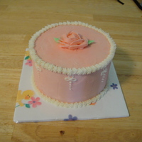 Mother's Day 6" white chocolate cake with cheese cake mousse and white chocolate buttercream.