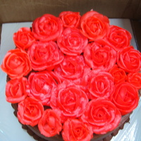 Roses For my mom's birthday, 8" chocolate cake with chocolate mousse, chocolate ganache and covered in chocolate buttercream. I added...