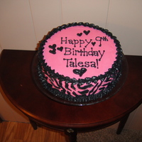 Pink & Black Zebra 9" white cake with vanilla buttercream frosting.