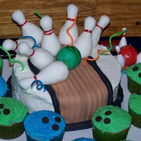 2Nd Bowling Birthday Cake This is a picture of a cake and "bowling ball" cupcakes that I made for my son's kiddie birthday party. I figured cupcakes...