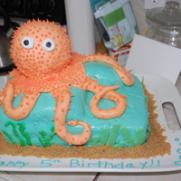 Orange Octopus Let me start off by saying this is the first cake (and first post!) I have ever made, so it has many flaws!! The octopus was a Styrofoam...