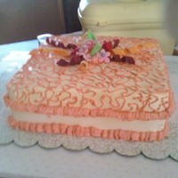 Square Cake as you can see I have a lot to work with, this is my first raffle, white with peach it came out rely good.