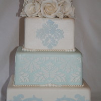 Damask Stencil On Blue And White Square damask stencil with gum paste rose topper