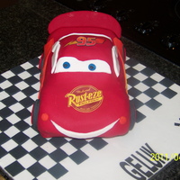 Lightning Mcqueen Choc cake. Used Wilton car pan and carved away the unwanted bits.