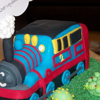 Thomas Train NOT an easy cake!!! Vanilla, covered with fondant. Still looking for the perfect, moist, easy to carve cake recipe. Had to do the cake 3 x...