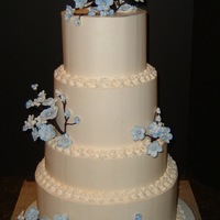 Perinkle Blossom Wedding buttercream with handmade blossoms