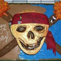 Pirates Of The Caribbean Skull Cake I made this Pirates of the Caribbean Skull cake freehand for my grandson's 10th birthday. The skull and torches sat on a full sheet...