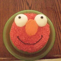 Elmo Birthday Cake Elmo birthday cake for my nephew. Red buttercream with fondant eyes.