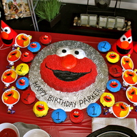 Elmo Cake With Cupcakes I made this cake for my son's first birthday. Needless to say he loved it, and I was thrilled with the outcome. It was my first...