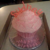 Big Pink Cupcake I did this big cupcake for a my friend's daughters 4th birthday. All he told me was that everything had to be pink. So i ran with that...