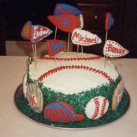 Baseball Theme Cake I made this cake for my grandson's 7th birthday. It is made of pound cake & Duncan Hines Vanilla Buttercream frosting with green...