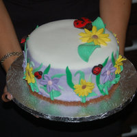 Ladybug, Garden First Birthday Red velvet cake with cream cheese frosting and fondant and gumpaste accents. The child was turning 1 and a nickname she has is "...