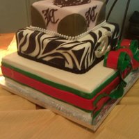 High Fashion Baby Shower Mom 2b requested vanilla with cream cheese frosting. The design was a collaboration between the two of us. Bottom tier is faux as she only...