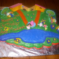 Dora Scene Cupcake Cake My daughter loves doing the kid cakes and so far everyone has been very happy. this dora scene is made on 36 cupcakes.