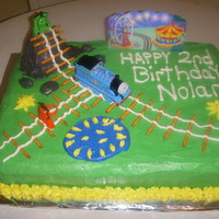 Thomas The Train Birthday Cake this thomas set is available for purchase and made the cake a success.