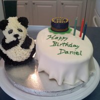 Panda Birthday The second cake we made for a customer also had to have a panda theme. the bear is a Wilton cake mold which works great. Fondant table...