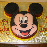 Mickey Mouse Chocolate and strawberry cake with buttercream icing.