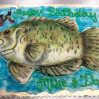 Fish You can't really tell it from the picture, but the fish is 3d. I carved it from a half sheet cake. It's all buttercream with...