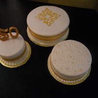 50Th Wedding Anniversary These cakes were made to celebrate a 50th Wedding Anniversary. They were to be placed/displayed on a 3-tier cake stand. I tinted the edible...