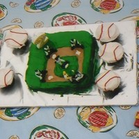 Baseball Birthday Cake This was the first cake beyond just the normal sheet cake I've ever made. It's a marble cake with colored buttercream frosting.
