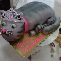 Princess Kitty The body is made out of cake and fondant, while the head and tail are made out of rice crispie. The feet are made out of fondant!