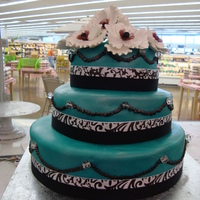 Teal Wedding Cake I did this for a fundraiser! I loved the color combination of teal black and white. It's my favorite!