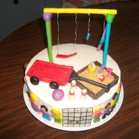 A Grandma's Birthday Cake Made this for my mom's birthday. Most of what her favorite things are revolves around grandkids and neighbors kids. White cake,...