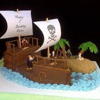 Pirate Ship butter cream with royal icing accents.