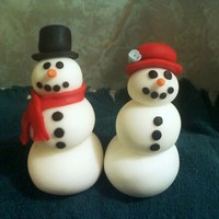 Snow Couple Fondant snowman and snowgirl I made for a globe cake Im making :) TFL