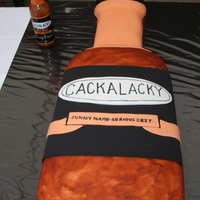 Cackalacky Bottle Cake This was a sweet potato cake made to celebrate the 10th anniversary of a friend's spice sauce (Cackalacky). The bottle was covered...