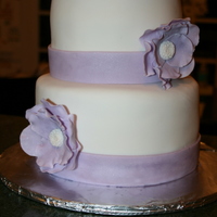 Inge's Wedding Cake My first wedding cake and flowers for my cousin. The bottom tier is chocolate cake with German's chocolate filling. The top is white...