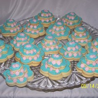 Tiered Wedding Cake Cookies Made 40 of these little wedding cakes for a bridal shower. This was my second time to make sugar cookies and decorate them.
