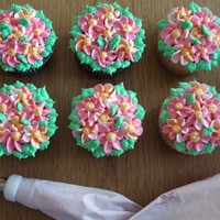 Drop Flower Bouquet Cupcakes Chocolate and white cupcakes decorated in buttercream drop flowers and leaves