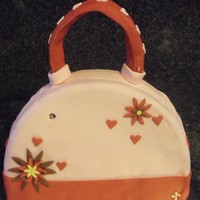 Purse Cake This is my first try at making a purse .. out of all the cake I can practice I choose a purse LOL... I took the pic after I had put the...