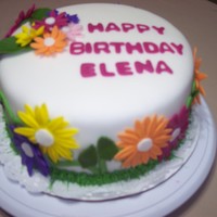 Flower Birthday Cake Multi colored flower cakes.