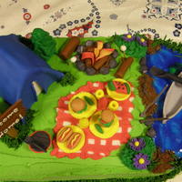 Welcome Home From Your Trip Gone camping, tent, canoe, grill with some yummy looking food.