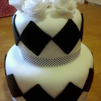 Black And White Mini Wedding Cake Red Velvet cake w/ vanilla frosting and fondant accents